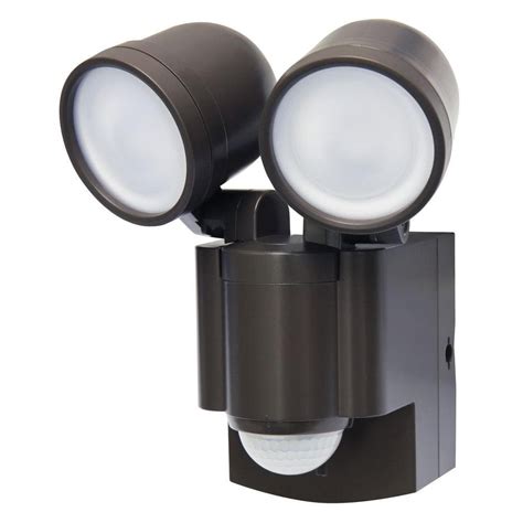 Home depot motion detector outdoor lights - Hover Image to Zoom. $ 13 04. Sleek black finish brings a standard look to your outdoor space. 270-degree motion detection with up to 70 ft. range. Compatible with two 150-watt E26 light bulb (s) View More Details. Fixture Color/Finish: Black. …